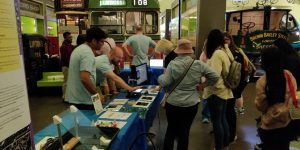 Interested people attending the event talk to our LC experts.